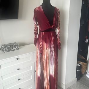 Maxi vacation dress. It has a split skirt with shorts under and tie top!